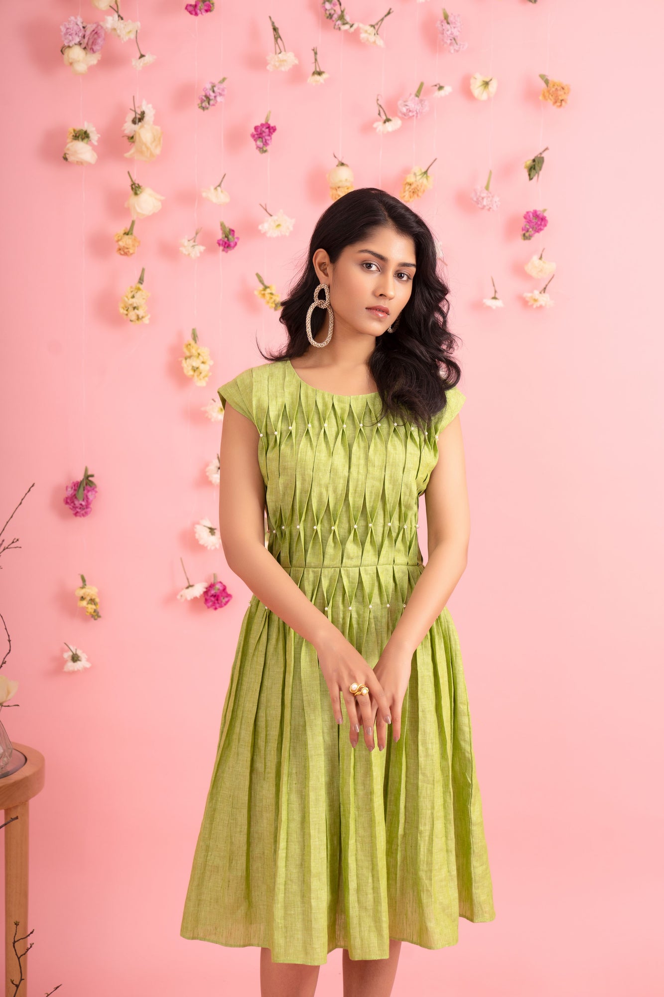 Elegant pearl pleated dress in premium fabric, showcasing artisanal craftsmanship and luxury womenswear sophistication