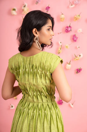Elegant pearl pleated dress in premium handloom fabric, showcasing luxury womenswear with artisan craftsmanship and refined silhouette