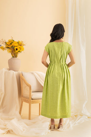 Elegant dragon-pleated dress in rich silk, showcasing intricate handloom craftsmanship and luxurious silhouette for discerning tastes
