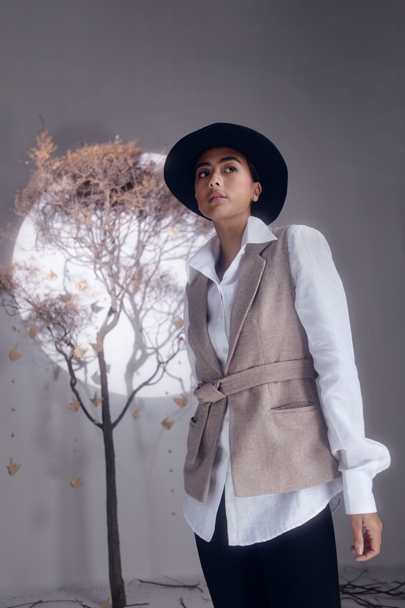 Handcrafted Pavilion Jacket in premium handloom fabric, showcasing elegant silhouette and luxury design in rich, sophisticated hues