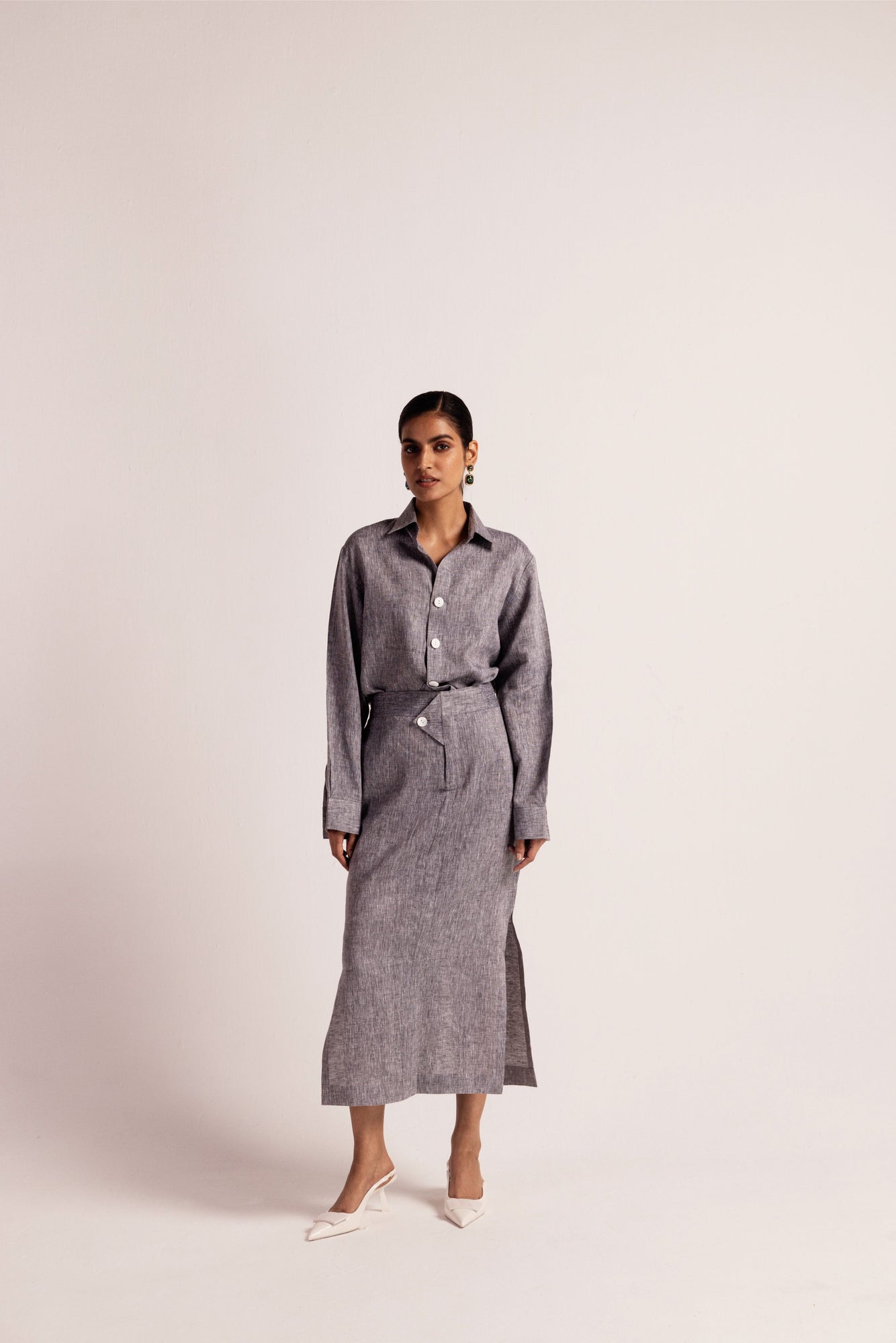 Misty grey linen co-ord set featuring a classic collared shirt and pencil skirt with slits, showcasing luxury artisan craftsmanship