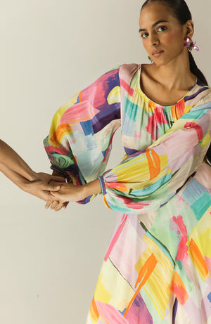 Elegant Aurora Crepe Silk Dress in soft pastel hues, showcasing a flowing silhouette and luxurious handloom craftsmanship