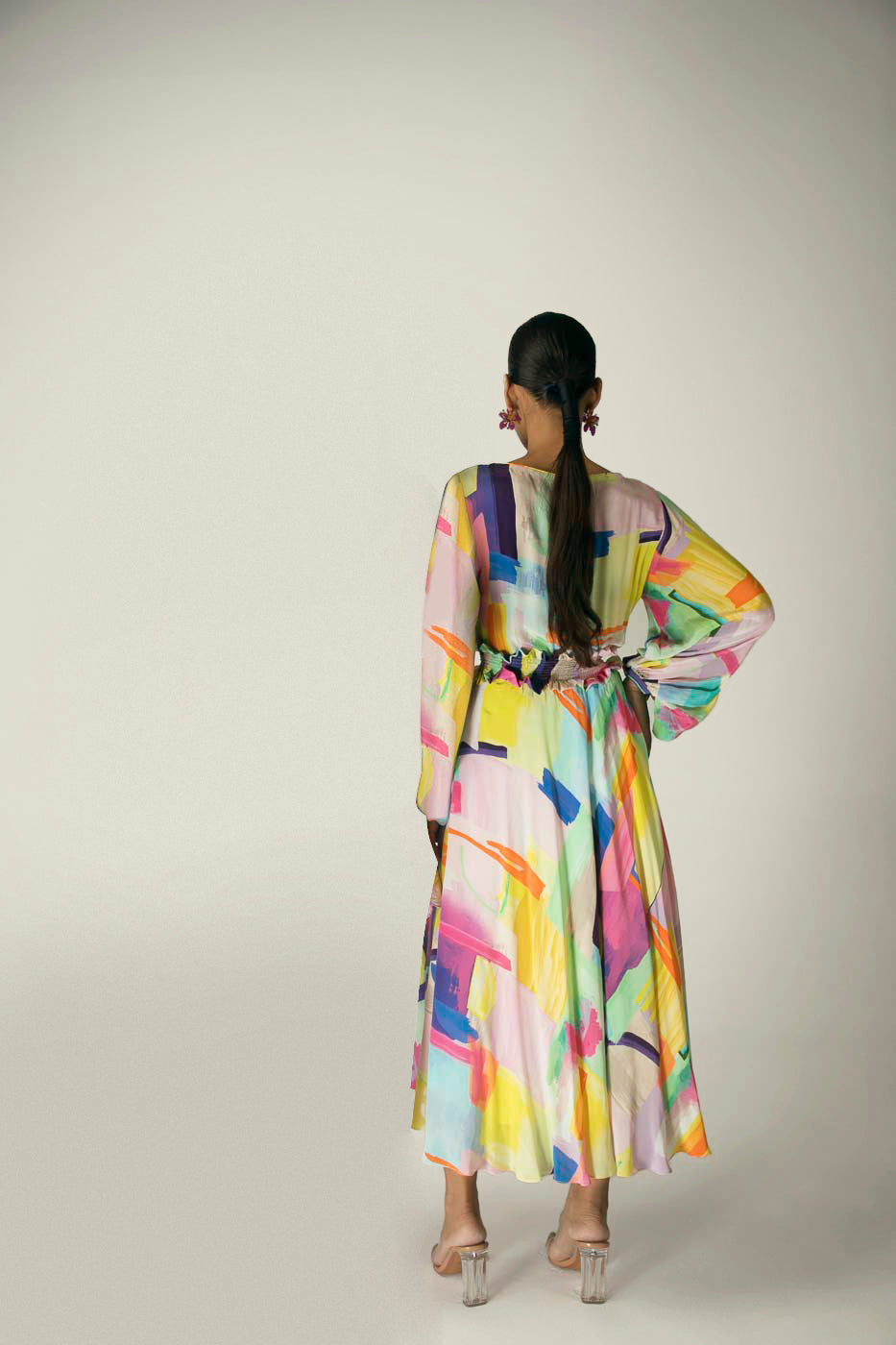 Elegant handloom silk dress in rich crepe, showcasing a luxurious silhouette with artisan detailing, epitomizing premium womenswear