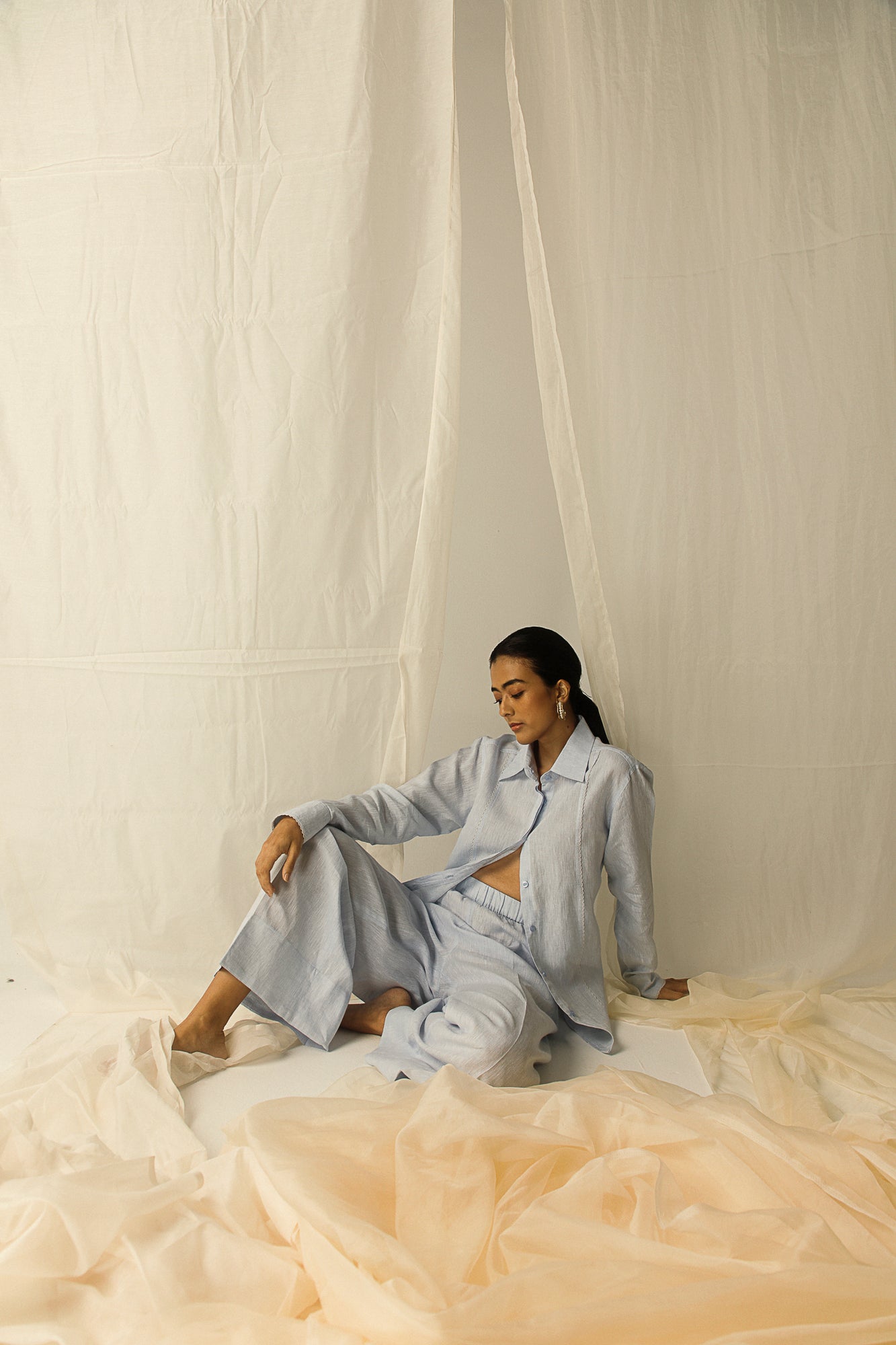 Elegant scallop-hem shirt in premium handloom fabric, showcasing artisan craftsmanship and luxury womenswear design
