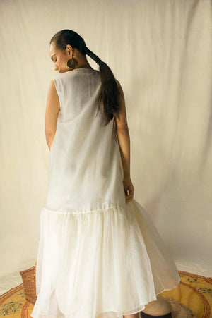 Elegant banana-butter dress in premium handloom fabric, showcasing a sophisticated silhouette and luxurious artisan craftsmanship