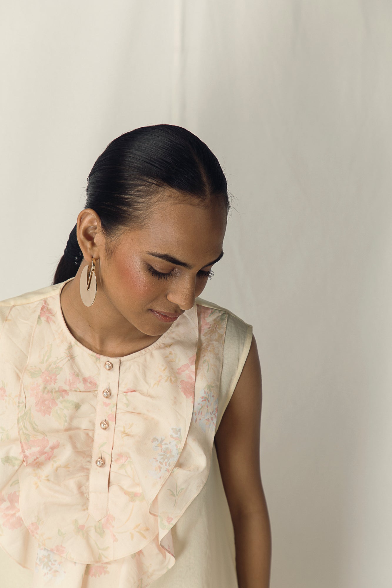 Elegant banana-butter dress in premium handloom fabric, showcasing a flowing silhouette and artisan craftsmanship for luxury womenswear