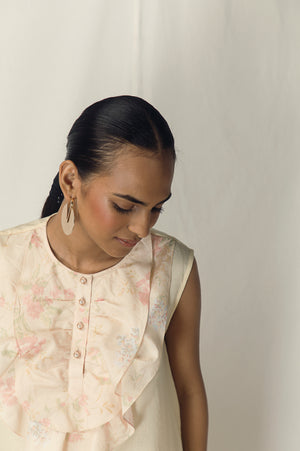 Elegant banana-butter dress in premium handloom fabric, showcasing a flowing silhouette and artisan craftsmanship for luxury womenswear