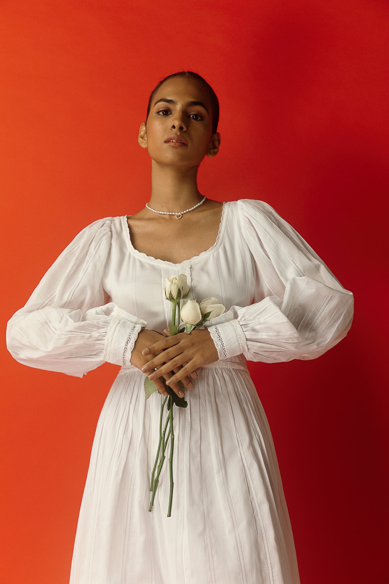 Elegant Bianca Cotton Midi Dress in handloom fabric, showcasing a refined silhouette and artisan craftsmanship for luxury womenswear