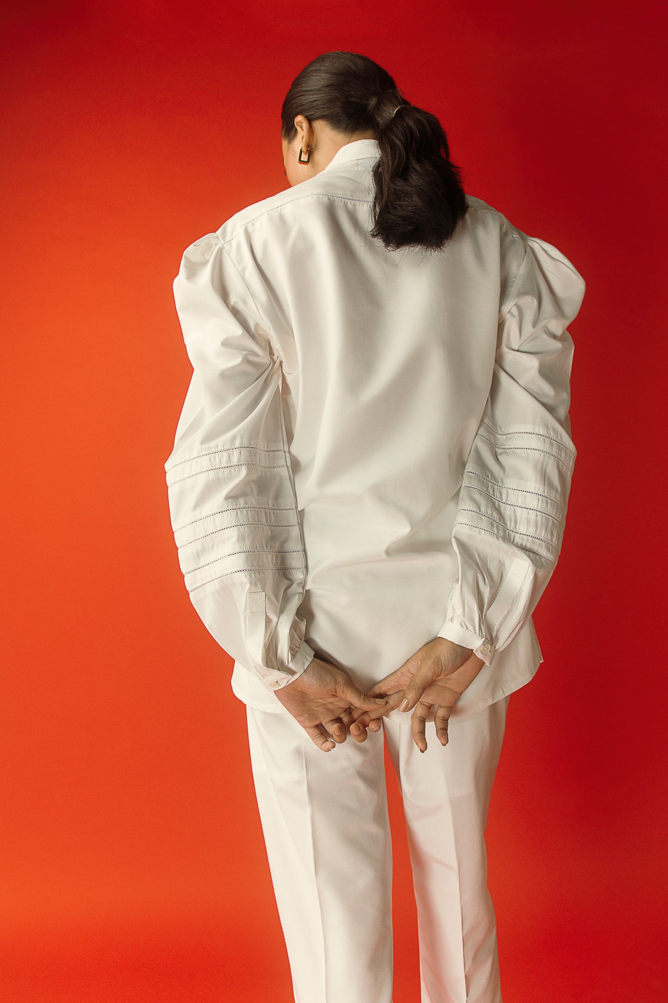 Elegant Bianca lace-up shirt in soft, handloom fabric, showcasing exquisite craftsmanship and luxury womenswear design