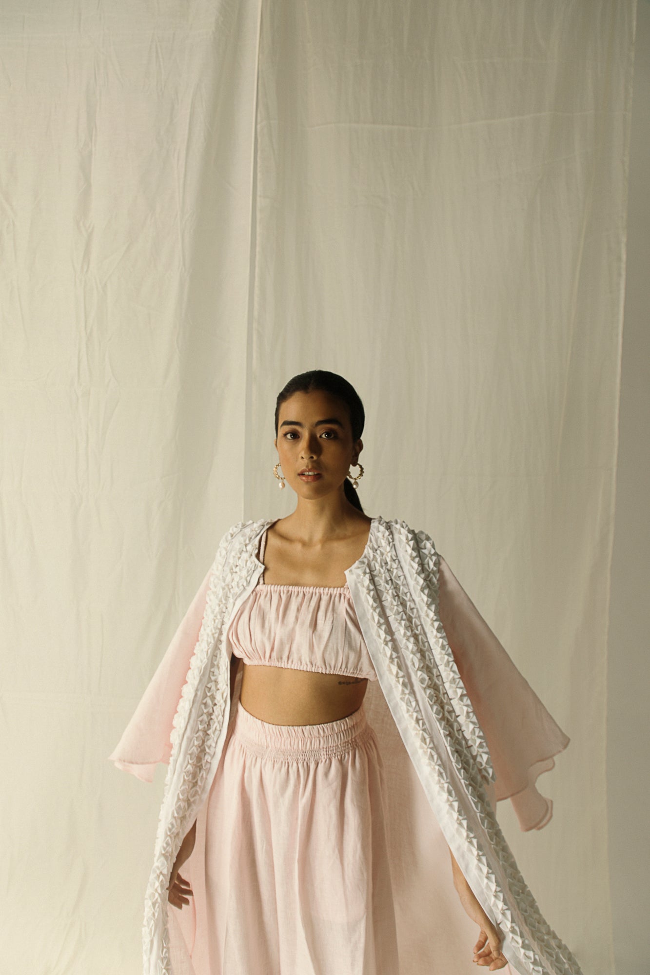 Handcrafted Bonheure Rosea Kaftan in soft pastel hues, showcasing premium fabric and elegant silhouette, epitome of luxury womenswear