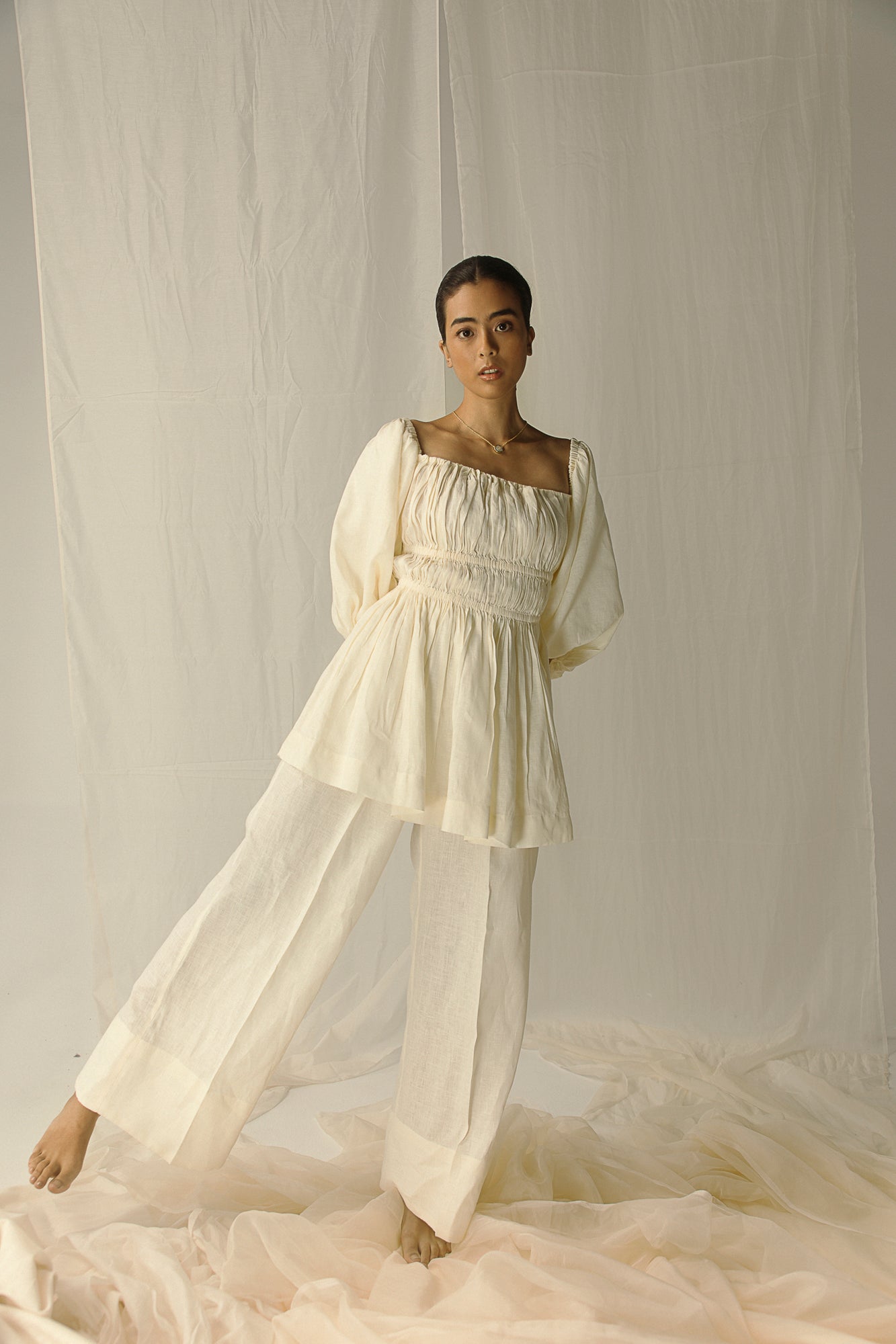 Elegant Giallo Chiaro top in premium handloom fabric, showcasing exquisite craftsmanship and luxurious silhouette for refined style