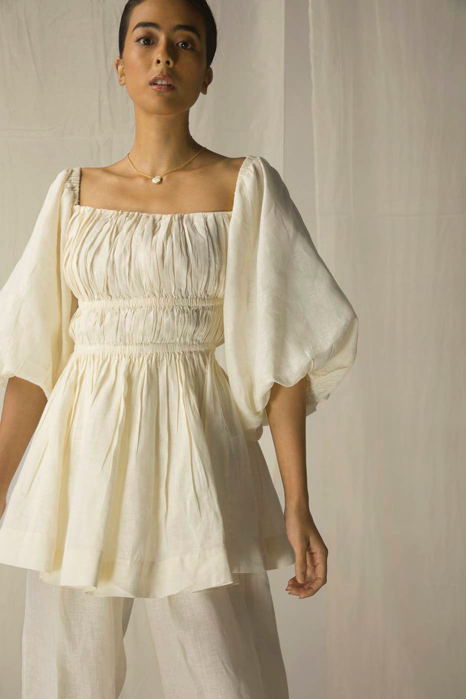 Exquisite Giallo Chiaro top in premium handloom fabric, showcasing NJ3 Atelier's artisan craftsmanship and luxury womenswear elegance