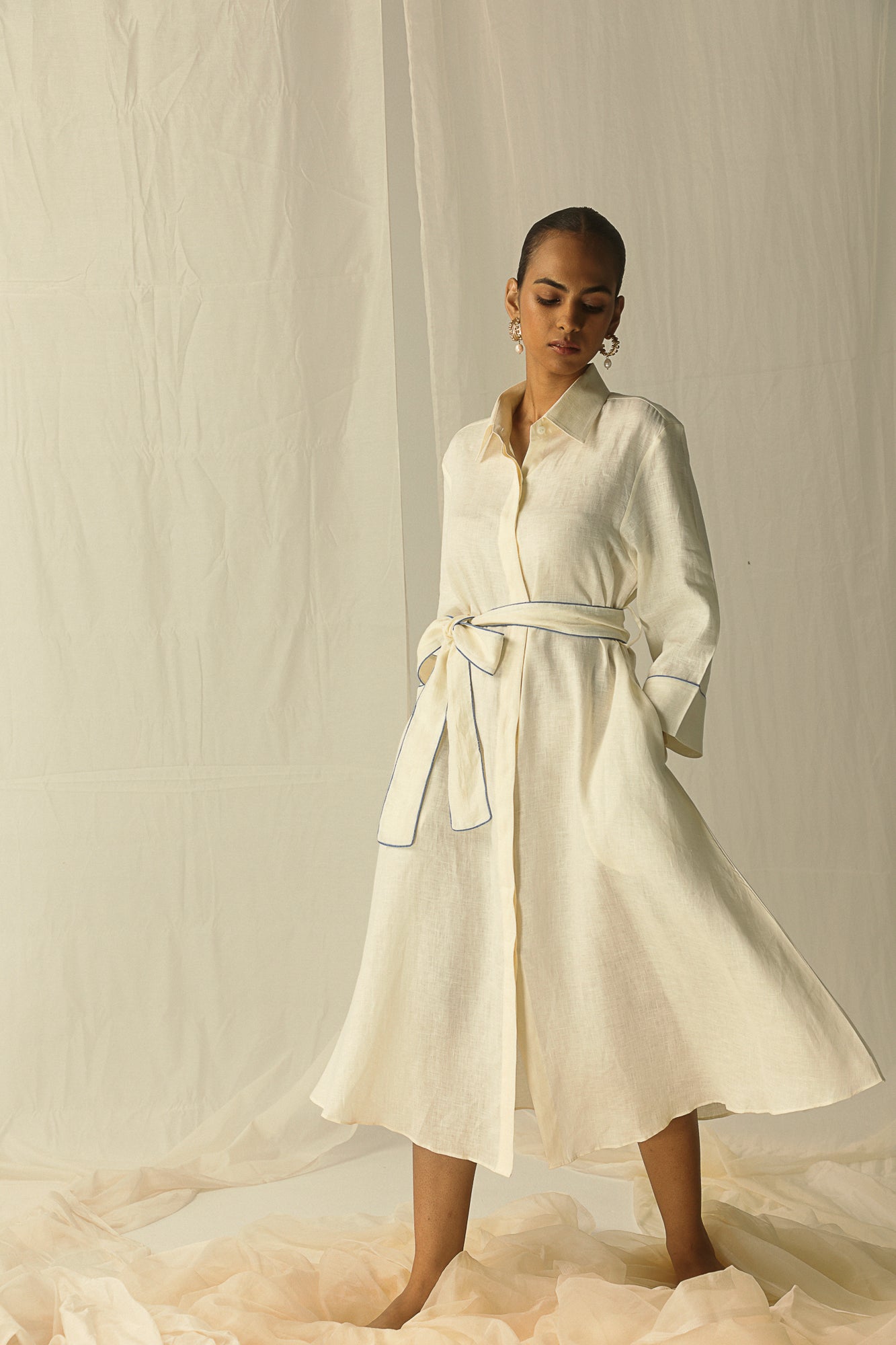 Yellow midi shirt dress in pure Italian linen, featuring a waist belt. Handcrafted luxury womenswear, perfect for sophisticated elegance