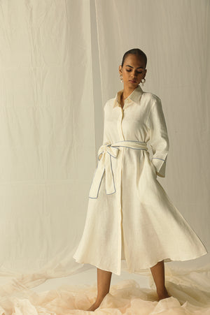 Yellow midi shirt dress in pure Italian linen, featuring a waist belt. Handcrafted luxury womenswear, perfect for sophisticated elegance