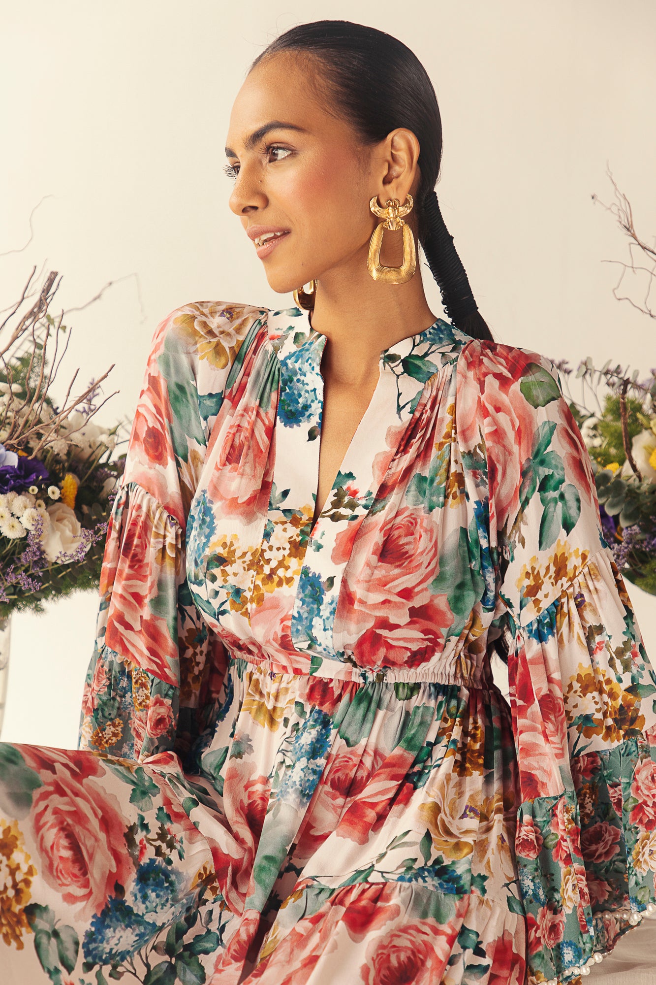 Elegant side view of the Rose Ballet Midi Dress, showcasing its handcrafted details, premium fabric, and luxurious silhouette in soft rose