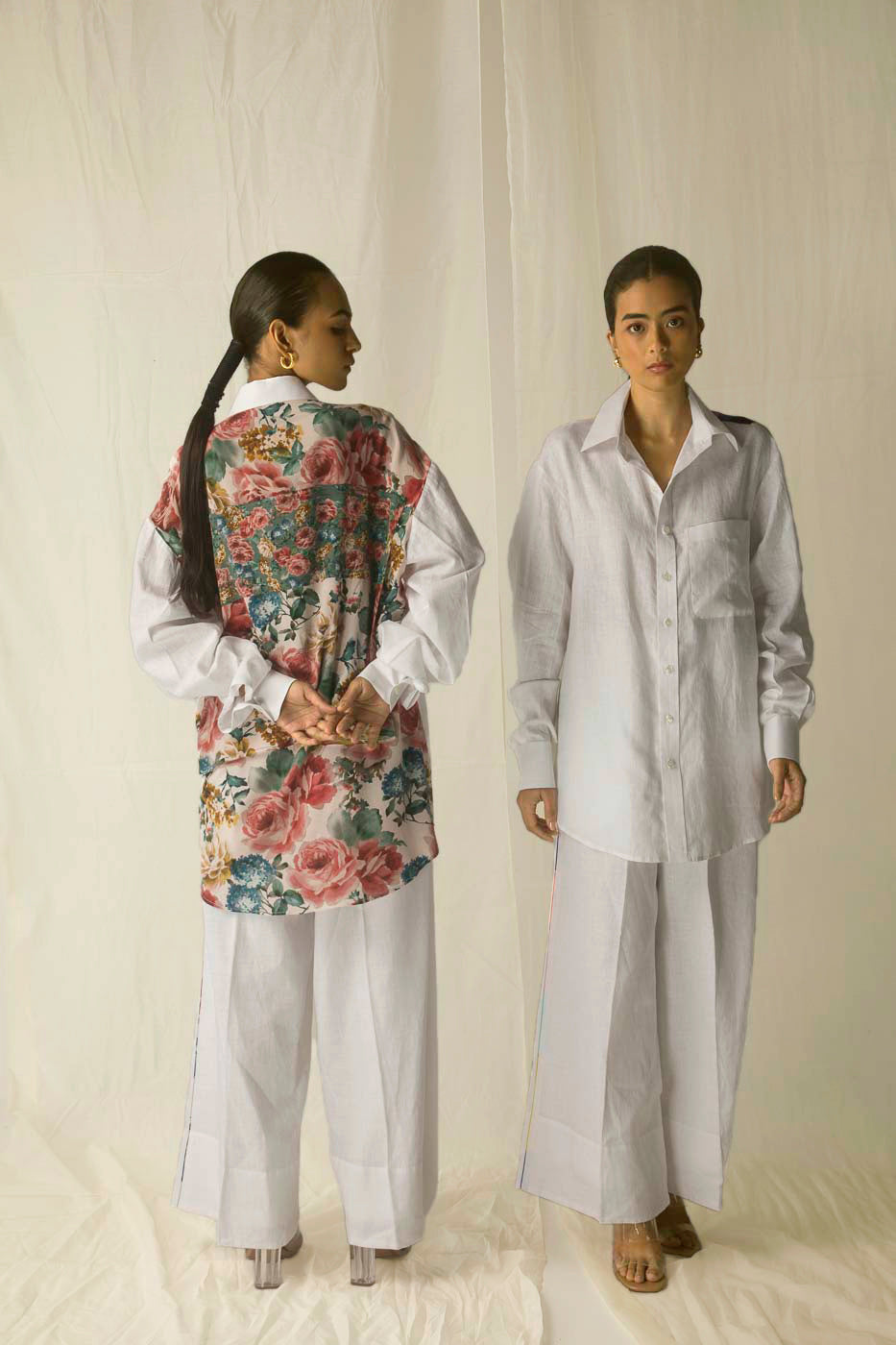 Luxurious white linen shirt with vibrant multicolored crepe silk back, showcasing artisan craftsmanship and premium womenswear elegance