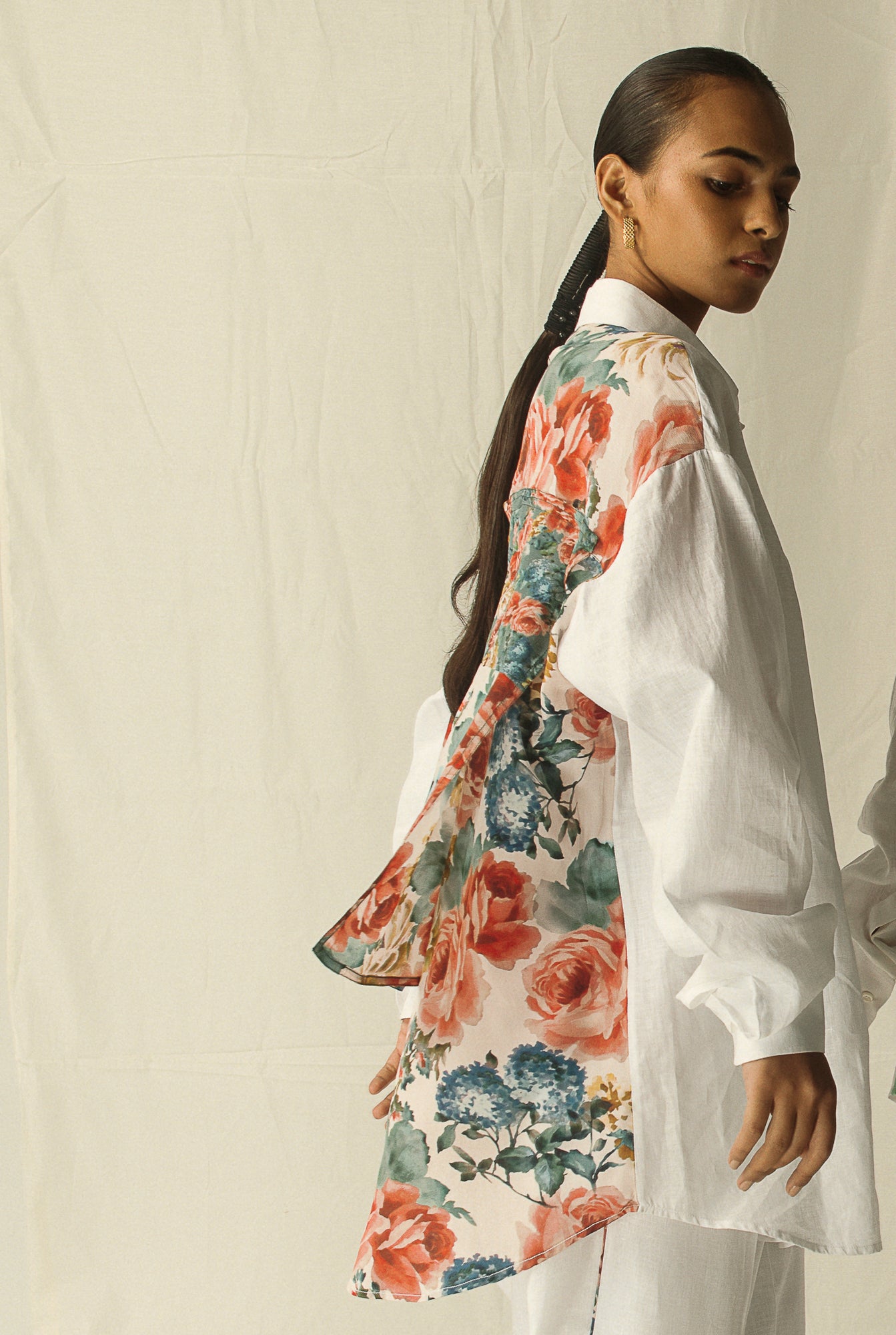 Elegant rose-white shirt crafted from premium handloom fabric, showcasing a tailored silhouette and exquisite artisan detailing