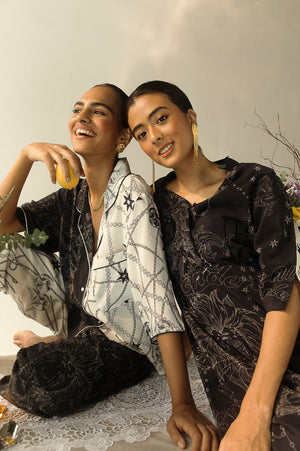 Handcrafted luxury women's top in premium black and white fabric, showcasing an elegant silhouette and artisan craftsmanship