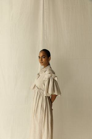 Manor Stone Dress in premium handloom fabric, showcasing a tailored silhouette with artisan-crafted details, epitomizing luxury womenswear