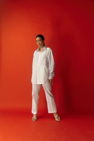 Mauvelous pink stripe shirt in premium handloom fabric, showcasing a tailored silhouette and artisan craftsmanship for luxury womenswear