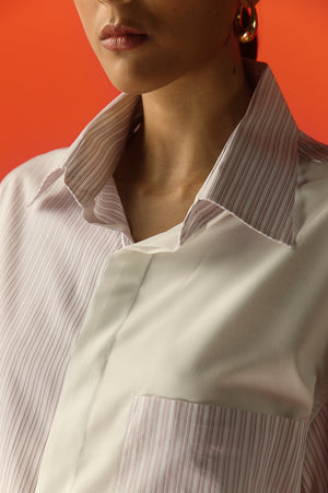 Close-up of mauve pink stripe shirt in premium handloom fabric, showcasing luxury craftsmanship and elegant design for women