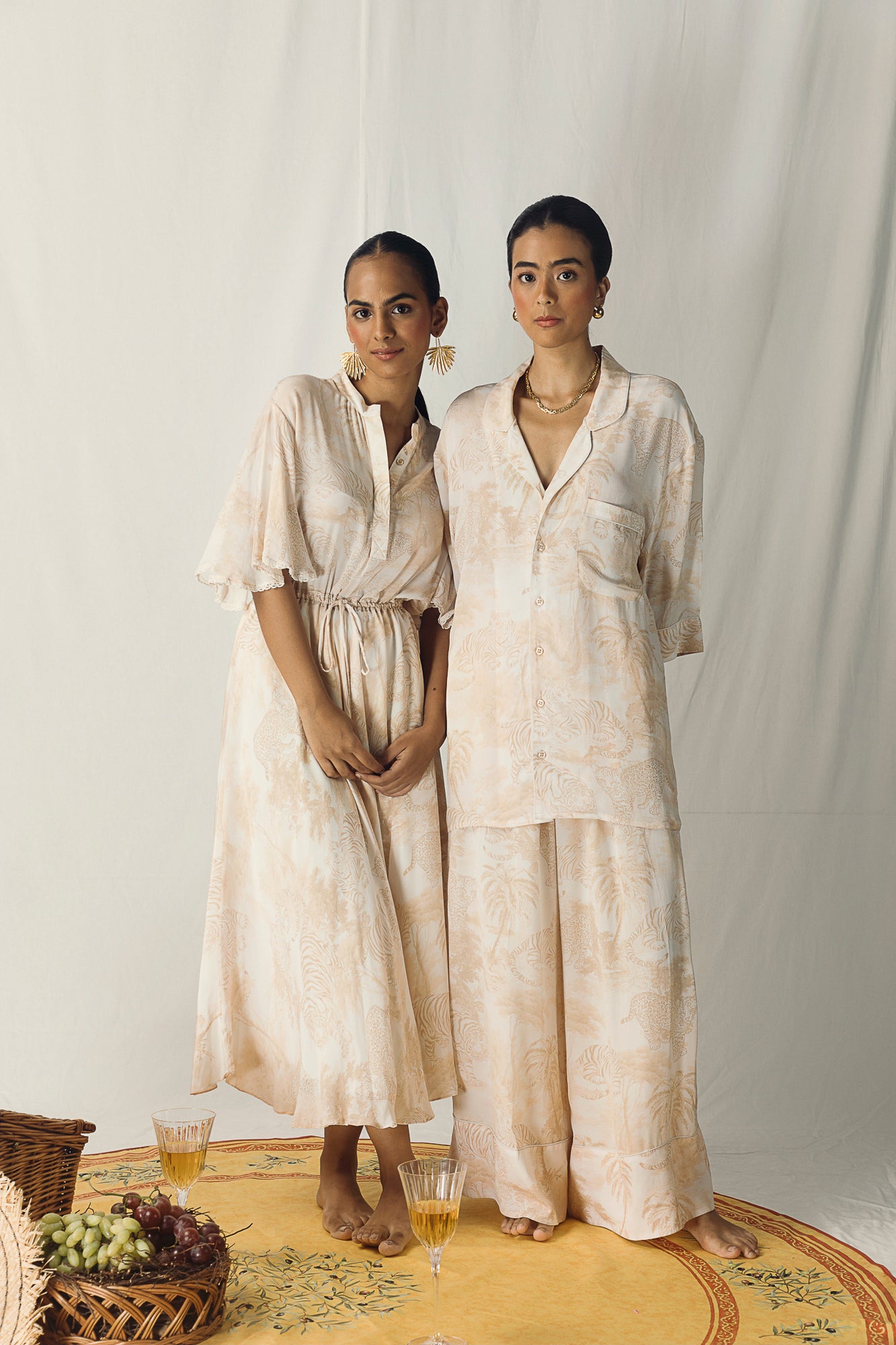Luxurious wide-leg palazzo pants in tiger print, crafted from pure crape silk in white and beige, embodying artisan craftsmanship