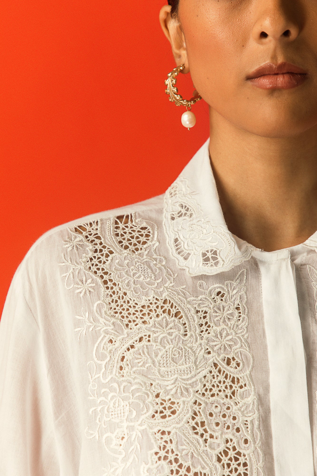 Handcrafted white mulmul shirt by NJ3 Atelier, featuring artisan embroidery, premium fabric, and luxury womenswear elegance