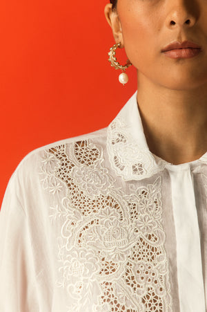 Handcrafted white mulmul shirt by NJ3 Atelier, featuring artisan embroidery, premium fabric, and luxury womenswear elegance