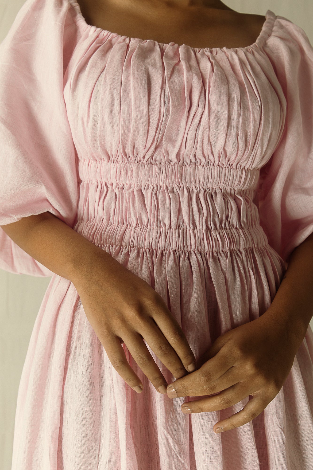 Elegant Rosa Blouson Ball Dress in premium handloom fabric, showcasing artisan craftsmanship and luxurious silhouette in soft blush