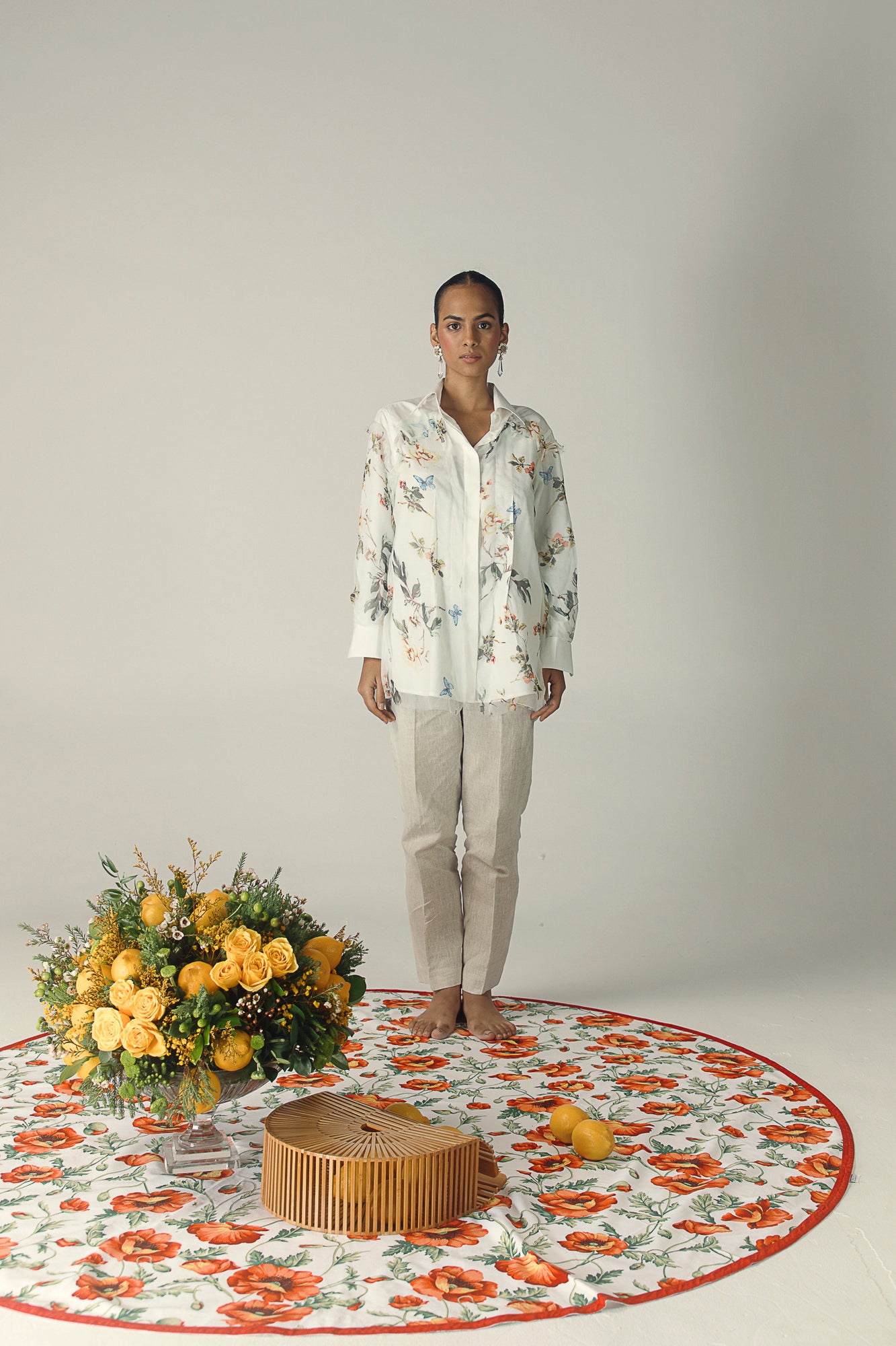 Elegant white shirt with butterfly split design, showcasing premium handloom fabric and artisan craftsmanship, embodying luxury womenswear