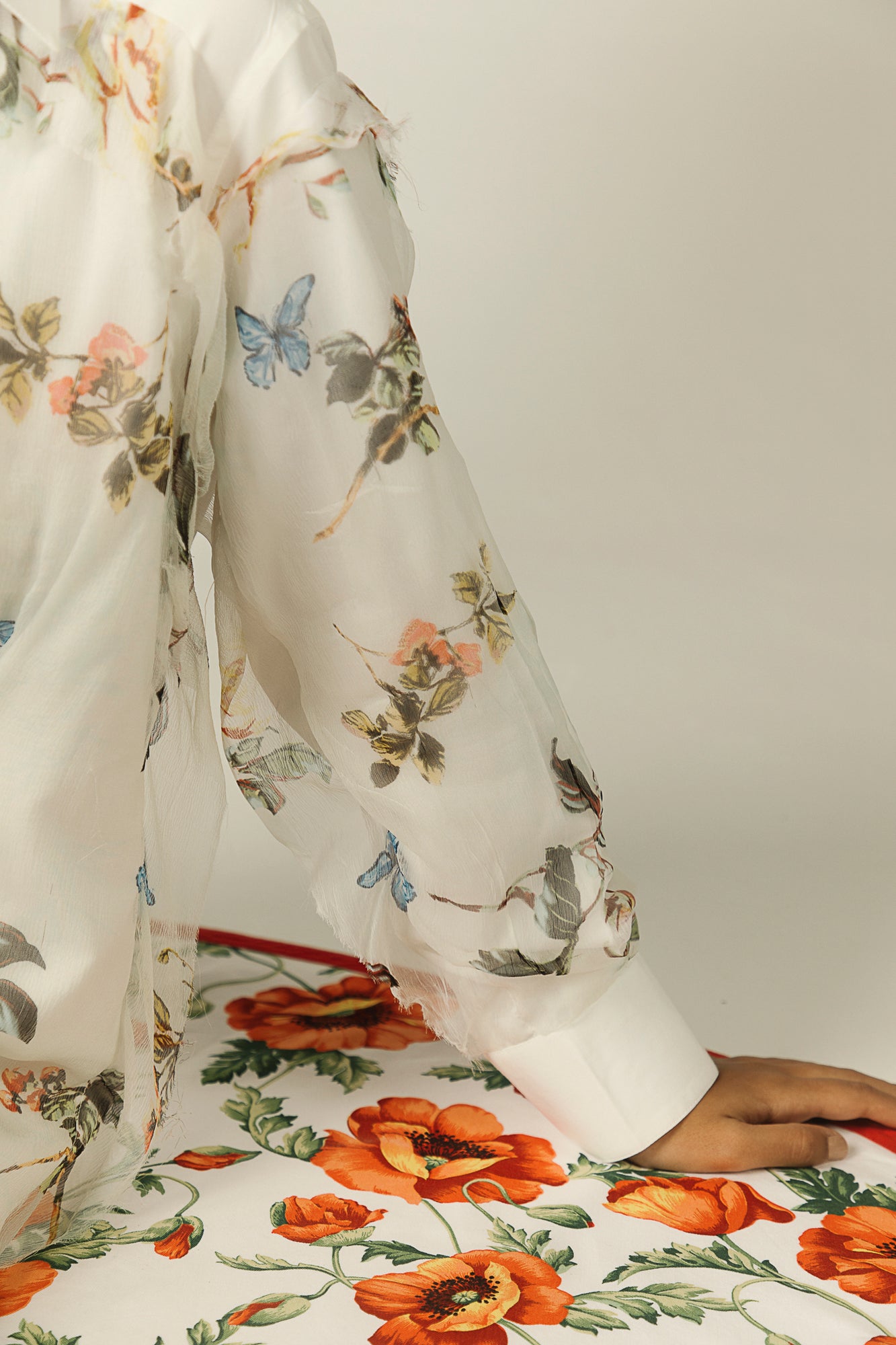 Elegant white shirt with split butterfly design, crafted from premium handloom fabric, epitomizing luxury womenswear by NJ3 Atelier