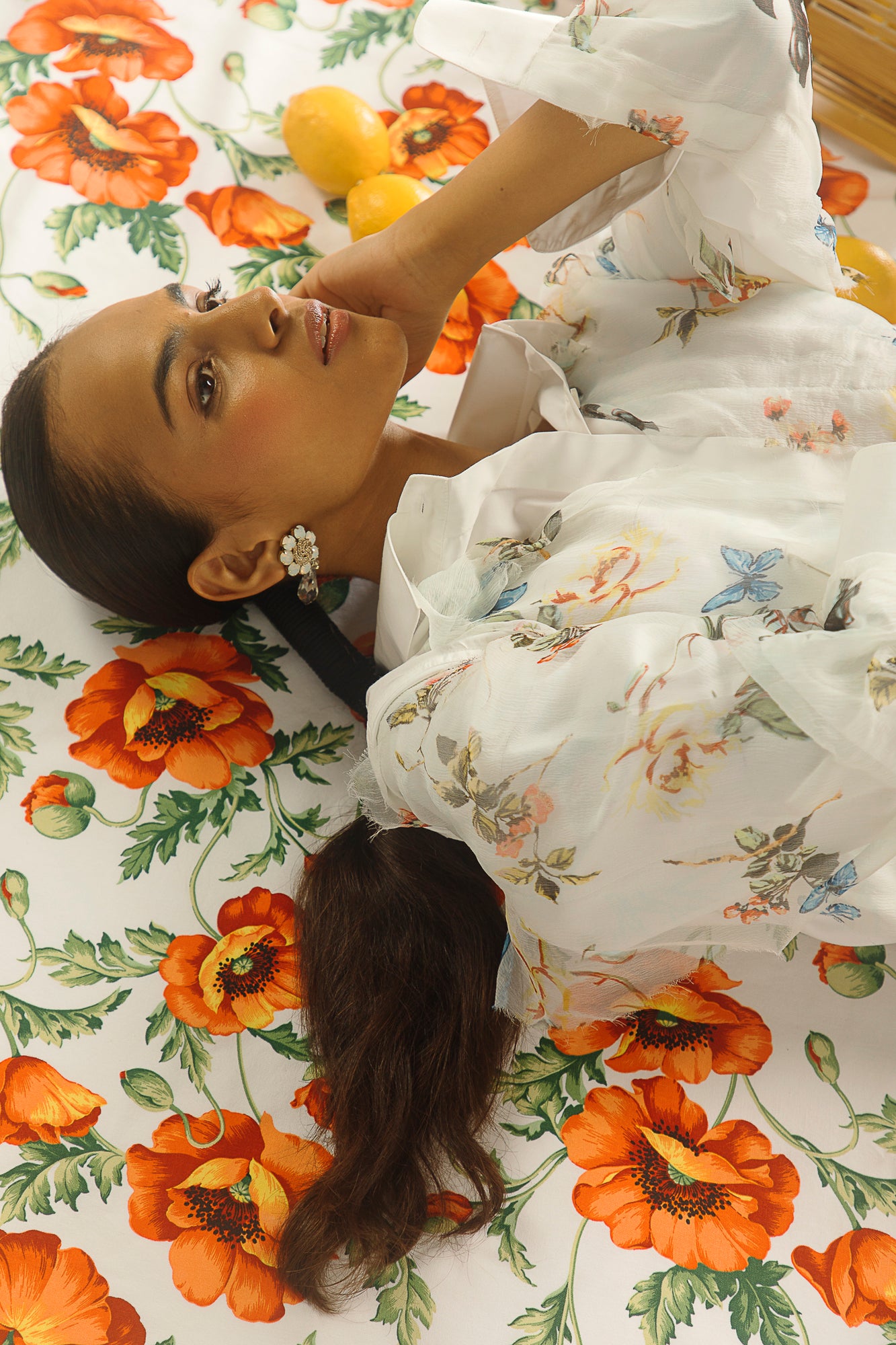 Elegant white shirt with split butterfly design, showcasing premium handloom fabric and artisan craftsmanship, epitomizing luxury womenswear